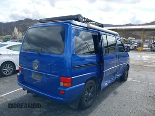 2002 Volkswagen EuroVan MV с VIN WV2NB47002H005993, выставлен на аукционе IAAI как лот 41568379 с пробегом 143 133 миль миль и . История ставок и продаж доступна на DreamBid. Изображение 4.