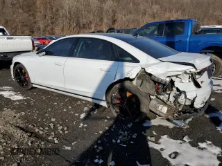 2023 Audi S8 with VIN WAULSAF85PN000614, listed as a Copart auction lot 43214585 with 20,079 mi miles and Salvage Title. Bid and sale history available at DreamBid. Image 2.