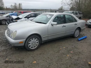 1999 Mercedes-Benz E-Class with VIN WDBJF65H5XA906877, listed as a Copart auction lot 76156014 with 141,956 mi miles and Clean Title. Bid and sale history available at carsss.com. Image 1.