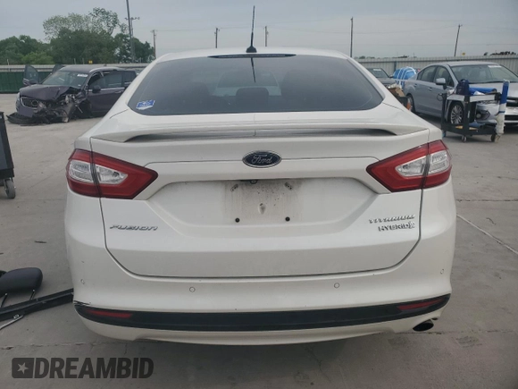 2013 Ford Fusion Titanium Hybrid с VIN 3FA6P0RU3DR282013, выставлен на аукционе Copart как лот 53651595 с пробегом 133 214 миль миль и Списание • Salvage title. История ставок и продаж доступна на DreamBid. Изображение 6.