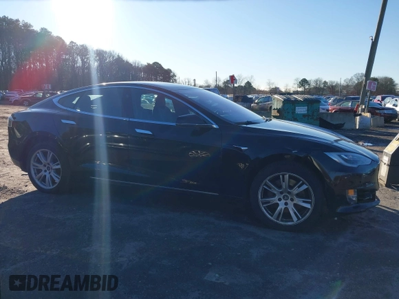 2020 Tesla Model S Long Range with VIN 5YJSA1E24LF413888, listed as a IAAI auction lot 41214903 with 42,711 mi miles and . Bid and sale history available at DreamBid. Image 13.