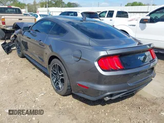 2023 Ford Mustang EcoBoost with VIN 1FA6P8TH6P5105487, listed as a IAAI auction lot 41877024 with 24,066 mi miles. Bid and sale history available at carsss.com. Image 3.