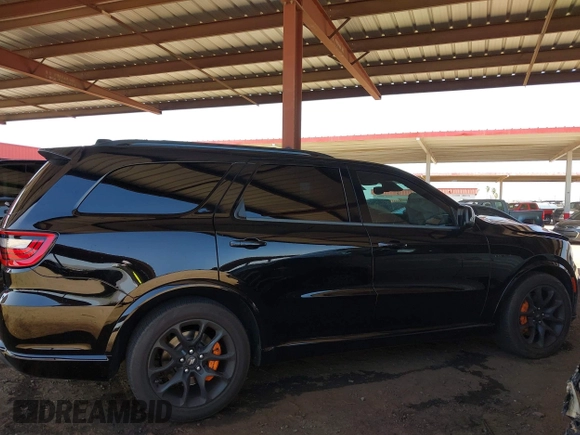 2023 Dodge Durango R/T Plus z VIN 1C4SDJCT1PC569635, wystawiony jako IAAI lot #42259684 z przebiegiem 24 148 mil mil oraz . Historia ofert i sprzedaży dostępna na DreamBid. Obrazek 13.