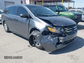 2015 Honda Odyssey LX with VIN 5FNRL5H27FB033136, listed as a IAAI auction lot 41842508 with 119,980 mi miles and . Bid and sale history available at DreamBid. Image 1.