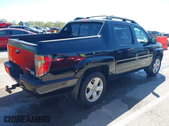 2013 Honda Ridgeline RTL with VIN 5FPYK1F57DB005538, listed as a IAAI auction lot 41985586 with 152,697 mi miles and . Bid and sale history available at DreamBid. Image 4.