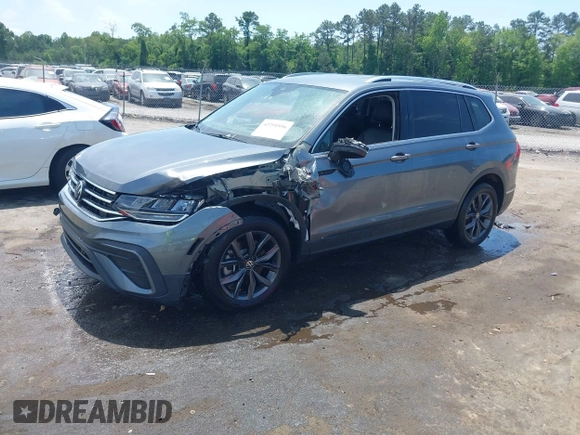 2023 Volkswagen Tiguan SE with VIN 3VV3B7AX3PM118743, listed as a IAAI auction lot 42291956 with 32,776 mi miles and . Bid and sale history available at DreamBid. Image 2.