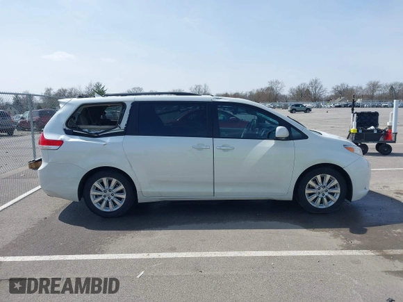 2011 Toyota Sienna XLE AAS with VIN 5TDYK3DC8BS085477, listed as a IAAI auction lot 41934541 with 131,768 mi miles and . Bid and sale history available at DreamBid. Image 13.