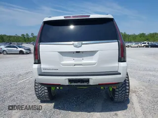 2020 Cadillac Escalade Luxury z VIN 1GYS3BKJ6LR124477, wystawiony jako IAAI lot #42042960 z przebiegiem 42 854 mil mil oraz . Historia ofert i sprzedaży dostępna na DreamBid. Obrazek 16.