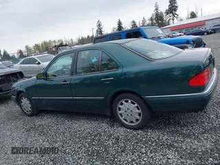 1998 Mercedes-Benz E-Class with VIN WDBJF65FXWA589630, listed as a IAAI auction lot 41990725 with 102,149 mi miles. Bid and sale history available at carsss.com. Image 14.