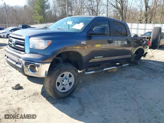 2013 Toyota Tundra 4WD Truck with VIN 5TFDW5F14DX283609, listed as a IAAI auction lot 41758175 with 196,393 mi miles. Bid and sale history available at carsss.com. Image 2.