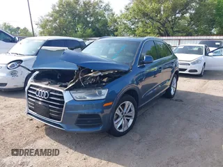 2016 Audi Q3 Premium Plus with VIN WA1BFCFS8GR010311, listed as a IAAI auction lot 41927789 with 91,400 mi miles and . Bid and sale history available at DreamBid. Image 2.