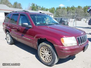 2003 Jeep Grand Cherokee Limited with VIN 1J4GW58S23C577383, listed as a IAAI auction lot 41957536 with 187,755 mi miles. Bid and sale history available at carsss.com. Image 1.