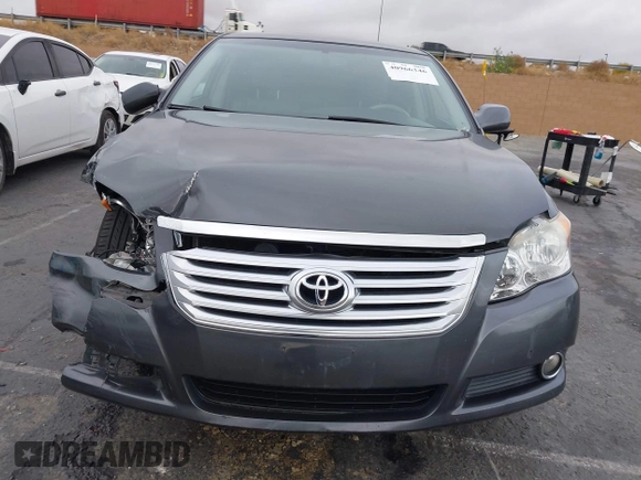 2010 Toyota Avalon XL with VIN 4T1BK3DB2AU368105, listed as a IAAI auction lot 40966346 with 147,122 mi miles and . Bid and sale history available at DreamBid. Image 12.