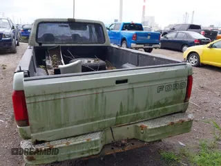 1992 Ford F-150 with VIN 1FTEX15Y2NKB09237, listed as a IAAI auction lot 42654726 with 260,150 mi miles and . Bid and sale history available at DreamBid. Image 14.