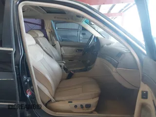 1999 BMW 7 Series 740il with VIN WBAGH8336XDP03839, listed as a IAAI auction lot 42067133 with 163,345 mi miles. Bid and sale history available at carsss.com. Image 5.