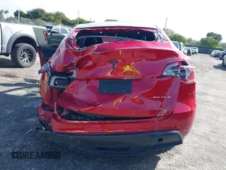 2022 Tesla Model Y Long Range z VIN 7SAYGDEE1NF385414, wystawiony jako IAAI lot #41660542 z przebiegiem 54 075 mil mil oraz . Historia ofert i sprzedaży dostępna na DreamBid. Obrazek 16.
