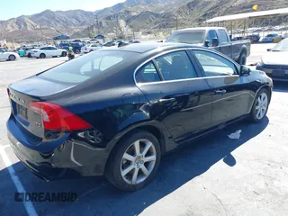 2016 Volvo S60 T5 Drive-E Premier with VIN YV126MFK5G2392022, listed as a IAAI auction lot 41517580 with 71,229 mi miles. Bid and sale history available at carsss.com. Image 4.