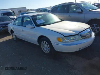2002 Lincoln Continental with VIN 1LNHM97V92Y678663, listed as a IAAI auction lot 41777625 with 173,329 mi miles. Bid and sale history available at carsss.com. Image 1.
