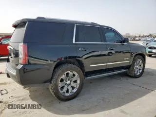2015 GMC Yukon Denali with VIN 1GKS2CKJ2FR580533, listed as a Copart auction lot 48455205 with 147,532 mi miles and Salvage Title. Bid and sale history available at carsss.com. Image 3.