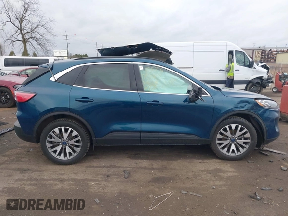 2020 Ford Escape Titanium with VIN 1FMCU9J98LUC00068, listed as a IAAI auction lot 41843755 with 42,525 mi miles and . Bid and sale history available at DreamBid. Image 13.