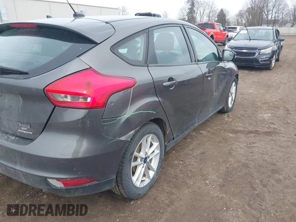 2015 Ford Focus SE with VIN 1FADP3K27FL303111, listed as a IAAI auction lot 41802182 with 195,834 mi miles and . Bid and sale history available at DreamBid. Image 14.