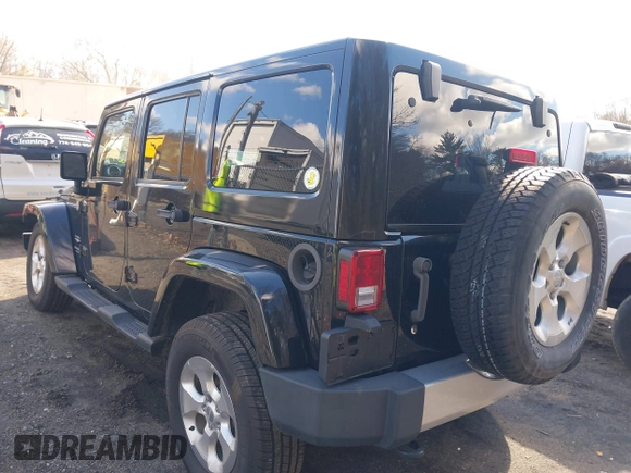2015 Jeep Wrangler Unlimited Sahara with VIN 1C4BJWEGXFL506361, listed as a IAAI auction lot 41865418 with 80,841 mi miles. Bid and sale history available at carsss.com. Image 3.