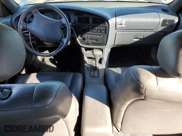1994 Toyota Camry XLE with VIN JT2GK13E9R0057812, listed as a Copart auction lot 88704015 with 153,621 mi miles and Salvage Title. Bid and sale history available at carsss.com. Image 8.