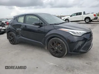 2021 Toyota C-HR LE with VIN JTNKHMBX7M1128976, listed as a Copart auction lot 54297035 with Not Provided miles and Salvage Title. Bid and sale history available at DreamBid. Image 4.