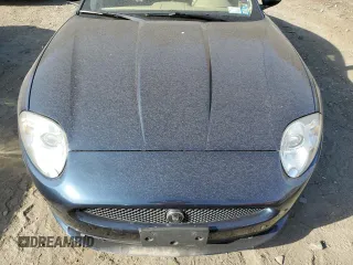 2009 Jaguar XK with VIN SAJWA43B995B30780, listed as a Copart auction lot 79119264 with 0 mi miles and Salvage Title. Bid and sale history available at carsss.com. Image 11.