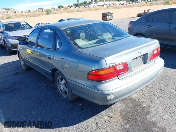 1998 Toyota Avalon XL with VIN 4T1BF18B3WU288614, listed as a IAAI auction lot 40632663 with 185,987 mi miles and . Bid and sale history available at DreamBid. Image 3.