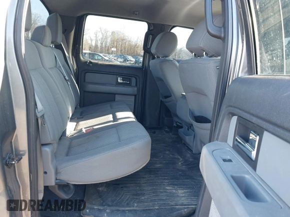 2013 Ford F-150 XL with VIN 1FTFW1ET6DFD65707, listed as a IAAI auction lot 41592995 with 215,848 mi miles and . Bid and sale history available at DreamBid. Image 8.