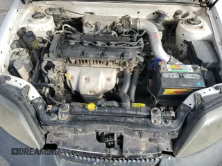 2003 Hyundai Tiburon z VIN KMHHM65D53U042971, wystawiony jako Copart lot #86919434 z przebiegiem 202 250 mil mil oraz Szkoda całkowita • Salvage title. Historia ofert i sprzedaży dostępna na DreamBid. Obrazek 11.