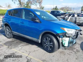 2018 Toyota RAV4 LE with VIN 2T3ZFREV9JW442691, listed as a IAAI auction lot 41946423 with 133,856 mi miles. Bid and sale history available at carsss.com. Image 1.
