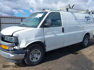 2019 Chevrolet Express Cargo Van with VIN 1GCWGAFG5K1341990, listed as a IAAI auction lot 41833132 with 79,532 mi miles. Bid and sale history available at carsss.com. Image 2.