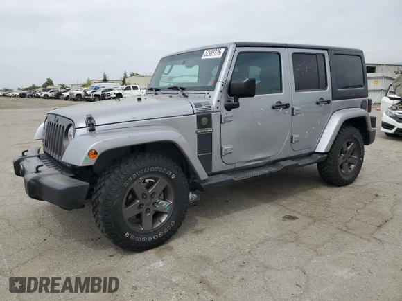 2016 Jeep Wrangler Unlimited Sport z VIN 1C4BJWDG5GL179046, wystawiony jako Copart lot #52989725 z przebiegiem 129 051 mil mil oraz Szkoda całkowita • Salvage title. Historia ofert i sprzedaży dostępna na DreamBid. Obrazek 1.