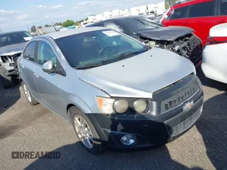 2012 Chevrolet Sonic LT with VIN 1G1JC5SH9C4136290, listed as a IAAI auction lot 42034254 with 273,427 mi miles and . Bid and sale history available at DreamBid. Image 1.