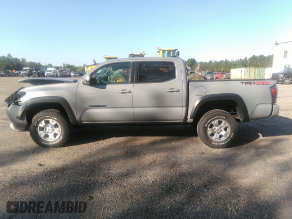 2020 Toyota Tacoma SR5 z VIN 3TMCZ5AN6LM330074, wystawiony jako IAAI lot #41982461 z przebiegiem 43 756 mil mil oraz . Historia ofert i sprzedaży dostępna na DreamBid. Obrazek 15.