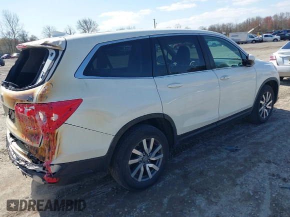 2019 Honda Pilot EX-L with VIN 5FNYF6H51KB052648, listed as a IAAI auction lot 41928269 with 67,878 mi miles and . Bid and sale history available at carsss.com. Image 4.