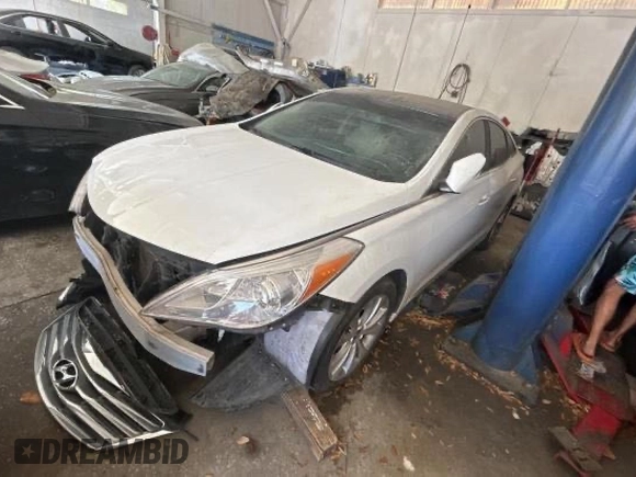 2013 Hyundai Azera с VIN KMHFG4JG4DA283684, выставлен на аукционе Copart как лот 62190285 с пробегом 58 994 миль миль и Чистый • Clean title. История ставок и продаж доступна на DreamBid. Изображение 2.