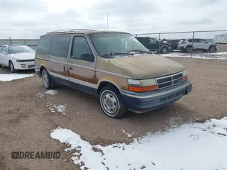 1991 Dodge Grand Caravan with VIN 1B4GK54R4MX558183, listed as a IAAI auction lot 41604086 with 210,400 mi miles and . Bid and sale history available at DreamBid. Image 1.