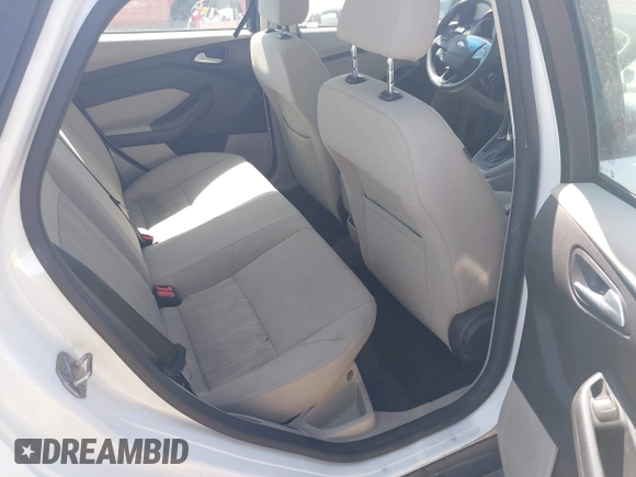 2015 Ford Focus SE z VIN 1FADP3F28FL334359, wystawiony jako IAAI lot #42520827 z przebiegiem 182 755 mil mil oraz . Historia ofert i sprzedaży dostępna na DreamBid. Obrazek 8.
