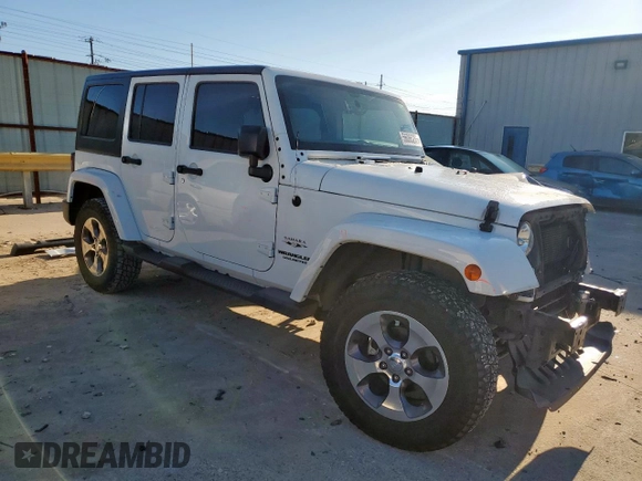 2016 Jeep Wrangler Unlimited Sahara z VIN 1C4HJWEG6GL218719, wystawiony jako Copart lot #56065235 z przebiegiem 96 061 mil mil oraz Szkoda całkowita • Salvage title. Historia ofert i sprzedaży dostępna na DreamBid. Obrazek 4.