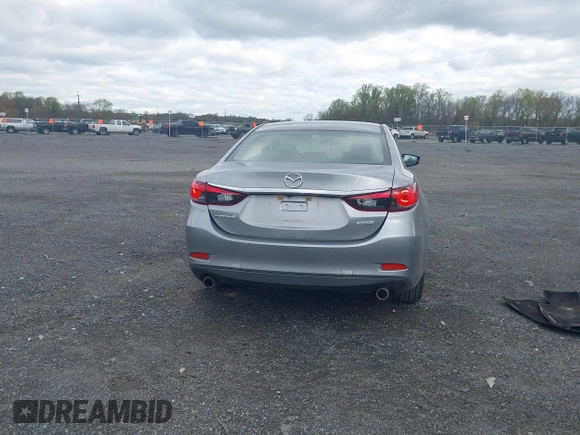 2014 Mazda 6 i Touring with VIN JM1GJ1V64E1147549, listed as a IAAI auction lot 42041025 with 124,400 mi miles and . Bid and sale history available at DreamBid. Image 16.