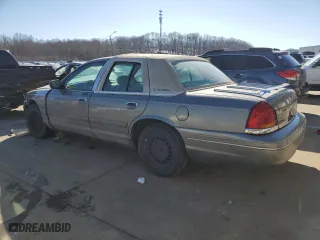 2000 Ford Crown Victoria with VIN 2FAFP73W8YX116581, listed as a Copart auction lot 42426805 with 122,218 mi miles and Salvage Title. Bid and sale history available at carsss.com. Image 2.