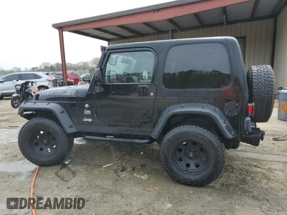 2004 Jeep Wrangler Sahara with VIN 1J4FA59SX4P722608, listed as a Copart auction lot 51223345 with 146,600 mi miles and Salvage title. Bid and sale history available at DreamBid. Image 2.