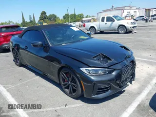 2021 BMW 4 Series M440i with VIN WBA53AT04MCG60058, listed as a IAAI auction lot 42638161 with 16,652 mi miles and . Bid and sale history available at DreamBid. Image 1.