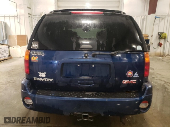2003 GMC Envoy SLT with VIN 1GKDT13S132184373, listed as a Copart auction lot 46138705 with 130,612 mi miles and Salvage Title. Bid and sale history available at carsss.com. Image 6.
