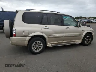 2006 Suzuki XL7 z VIN JS3TX92V564101429, wystawiony jako Copart lot #71942934 z przebiegiem 96 997 mil mil oraz Szkoda całkowita • Salvage title. Historia ofert i sprzedaży dostępna na DreamBid. Obrazek 3.