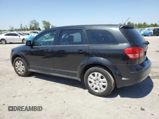 2013 Dodge Journey American Value with VIN 3C4PDCAB6DT709996, listed as a Copart auction lot 52362635 with 104,808 mi miles and Salvage Title. Bid and sale history available at DreamBid. Image 2.