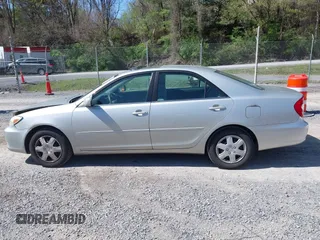 2004 Toyota Camry LE with VIN 4T1BE30K14U290983, listed as a IAAI auction lot 41983078 with 174,852 mi miles and . Bid and sale history available at carsss.com. Image 14.